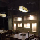 Lustre LED long avec barres en bambou