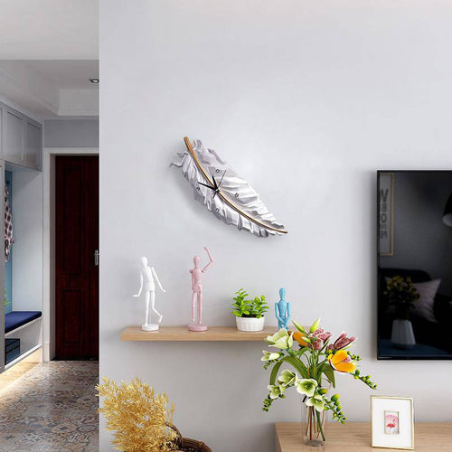 Horloge design en forme de plume blanche Creative - vue 2 sur 2