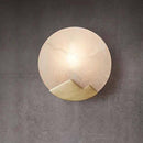 Applique murale design LED avec disque de marbre et métal doré