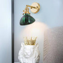Applique murale design LED dorée avec bras rétro et abat-jour en verre émeraude