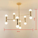 Lustre design en métal doré et lampes en boule
