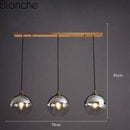 Suspension design LED avec boule en verre fumé Loft