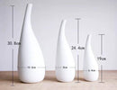Vase en céramique blanc arrondi style moderne