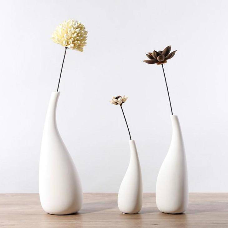 Vase en céramique blanc arrondi style moderne - vue 4 sur 5