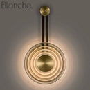 Applique murale design LED avec cercle doré et disque en verre Sconce