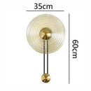 Applique murale design LED avec cercle doré et disque en verre Sconce