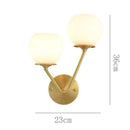 Applique murale design LED en métal doré avec double boule en verre