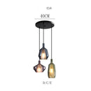 Suspension design à LED avec abat-jour en verre coloré