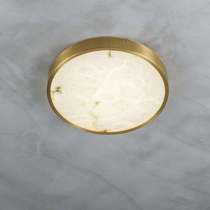 Plafonnier design LED rond en marbre avec bords dorés - vue 4 sur 9