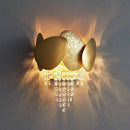 Applique murale design LED en verre cristal et métal martelé doré