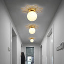 Plafonnier moderne LED avec soleil métallique et globe Sana