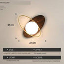 Applique murale à LED design avec socle arrondi et anneau doré Shadow
