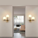 Applique murale design LED dorée avec boule en verre Wall