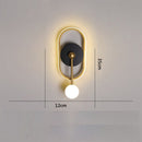 Applique murale design géométrique avec boule suspendue Oryna