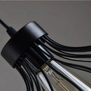 Suspension design industriel avec lampe en cage