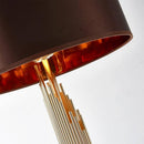 Lampadaire design doré avec abat-jour noir arrondi body