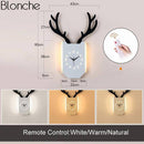 Applique murale LED corne de cerf et horloge