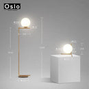 Lampadaire design à LED doré avec boule en verre