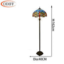 Lampadaire tiffany avec abat-jour en verre vitrail multicolore