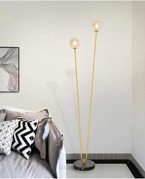 Lampadaire design avec deux branches doré et boules en verre - vue 4 sur 6