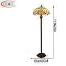 Lampadaire tiffany avec abat-jour en verre vitrail jaune