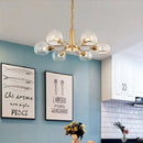 Lustre design moderne doré avec boules de verre Glass